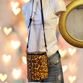 GUESS Y2K Leopard Calf Hair Bucket Bag w/ Ring Handle